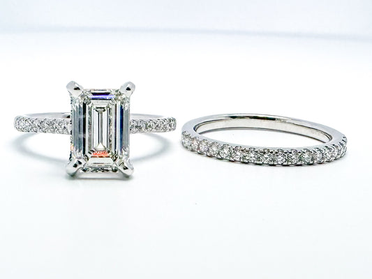 14k white gold 2.60 lab grown emerald cut wedding  set with .40 side diamonds