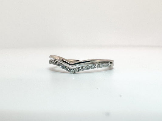 14k, White gold, .15 carats of natural diamonds. Wedding band.