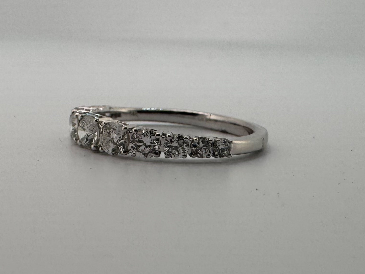 14K, white gold, taperd diamond wedding band. 1.00 carat total weight. Natural diamond