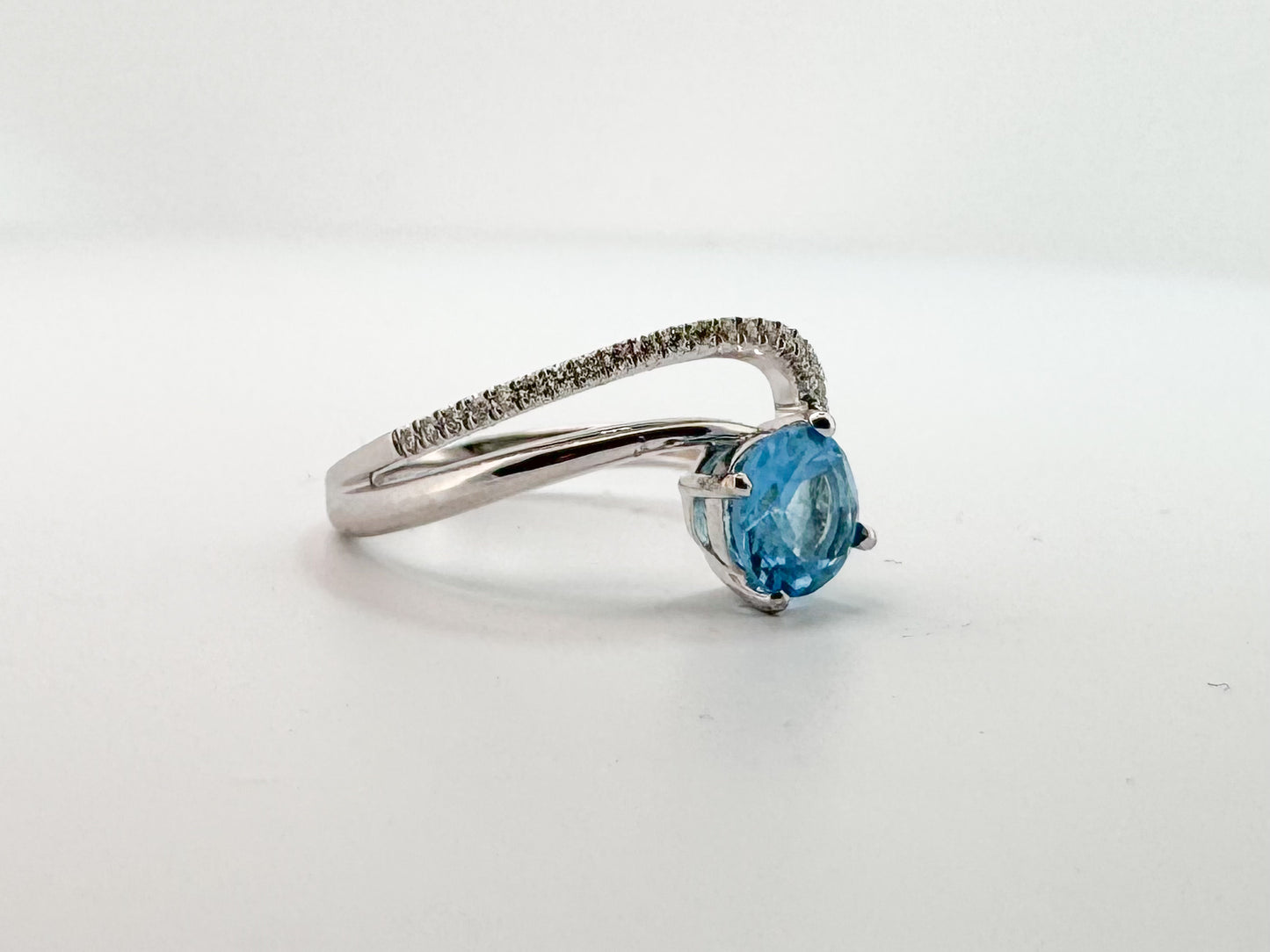 14K, white gold,  1.00 CT Blue topaz with .10 side diamonds fashion ring.