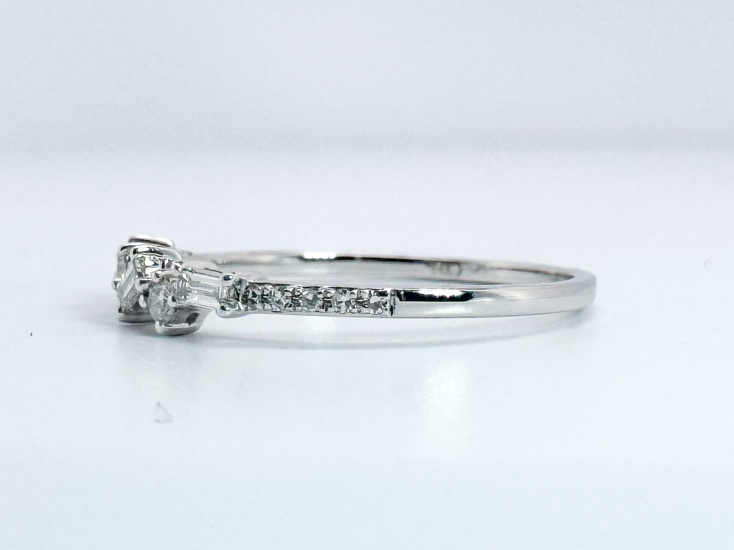 14K, white gold gold .23 diamond total weight, baguette and round brilliant diamond band