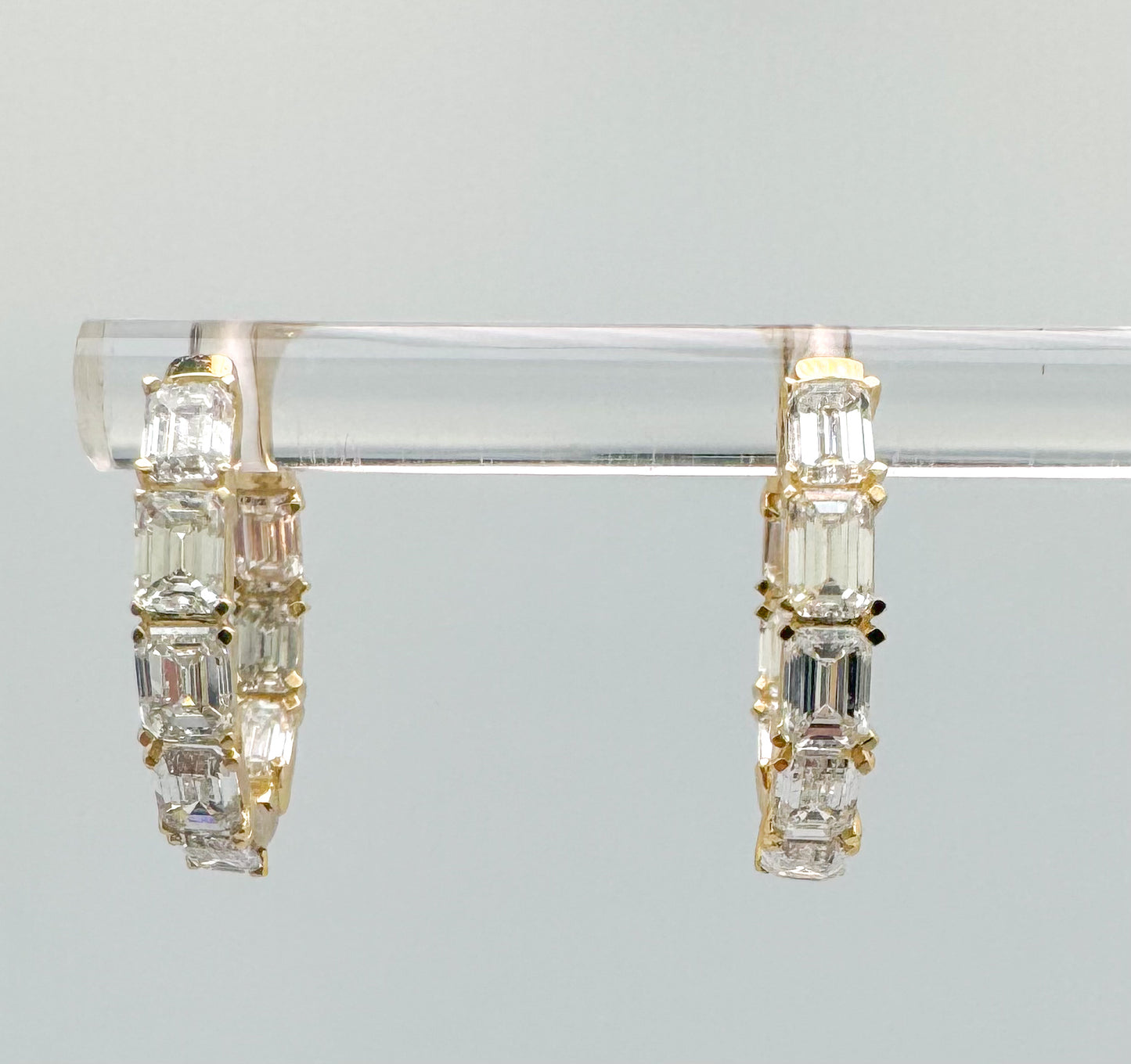 14K, Yellow gold, 2.45 carat total weight, lab grown emerald cut inside out earrings.