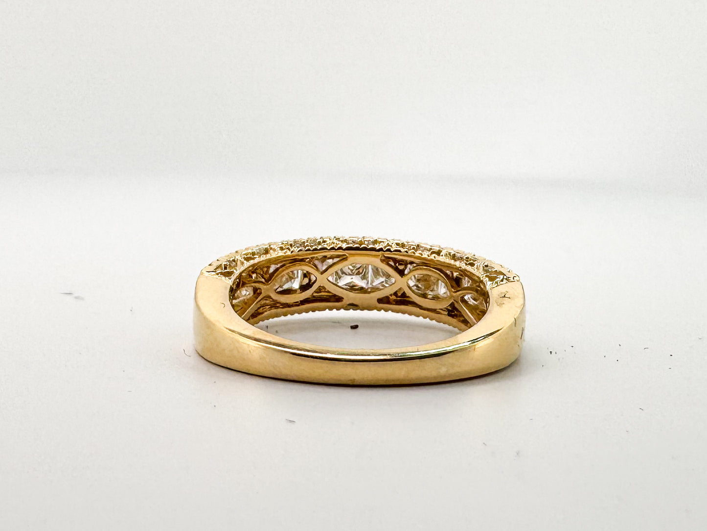 14k, Yellow gold ,princess cut and round brilliant diamond band.1.27 carats of natural diamonds.
