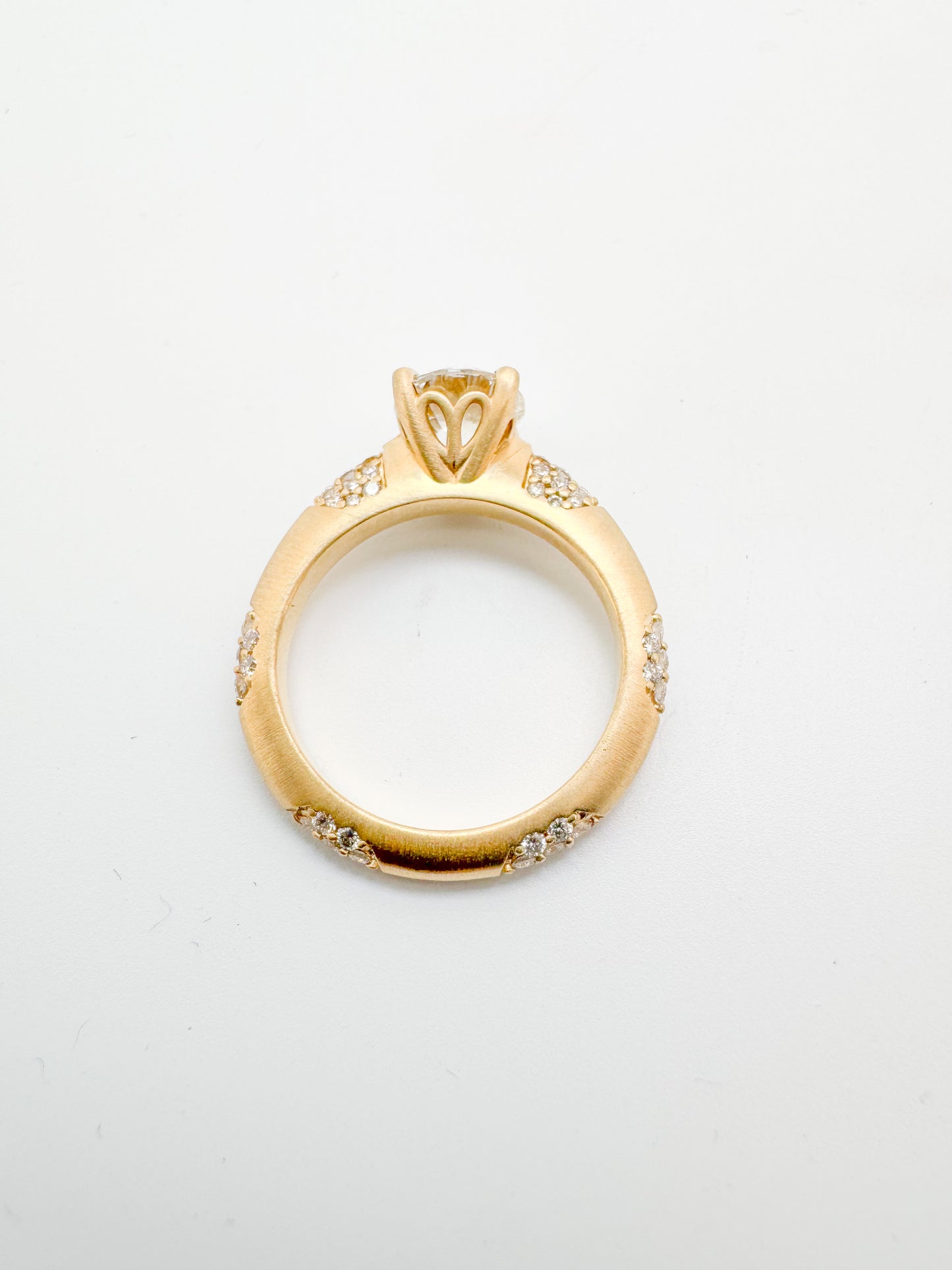 14k,Yellow gold, 1.50 natural round brilliant set in custom lace mounting.