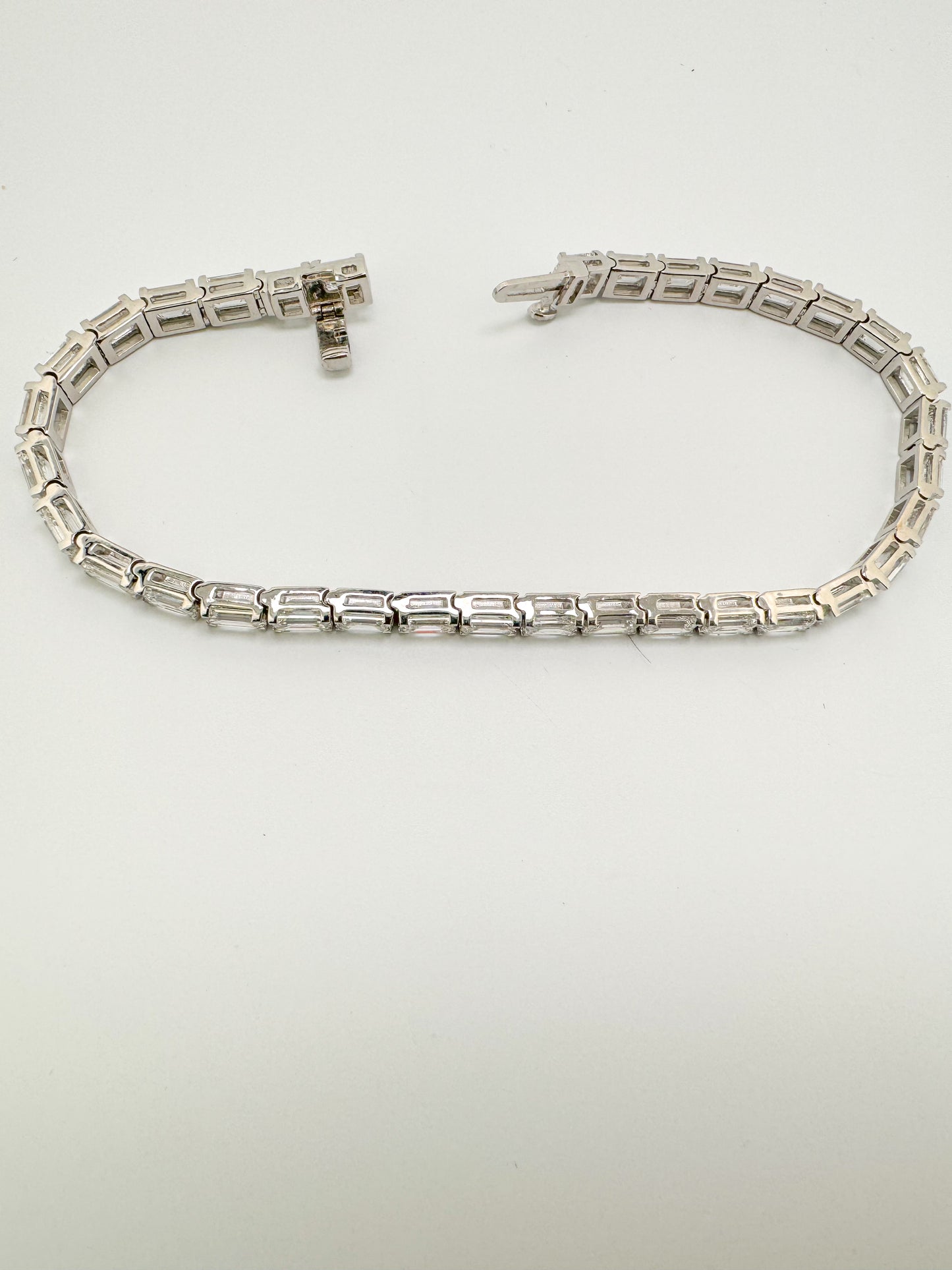 14k, white gold, 11.75 carat total weight, emerald cut, lab grown diamond tennis bracelet. VS1 E-F