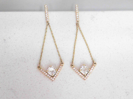 Custom chevron style dangle earrings with cushion cut diamond centers