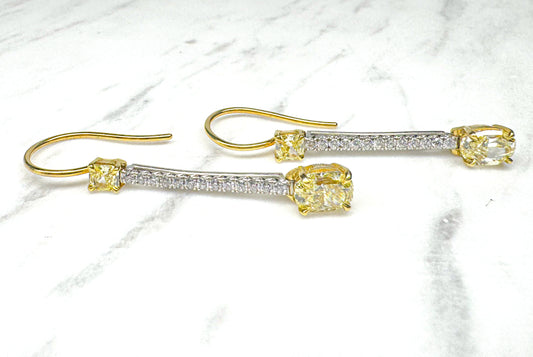 18k two tone NATURAL Fancy yellow Diamond earrings.2.37 carats of yellow diamonds and .30 carats of white diamonds.