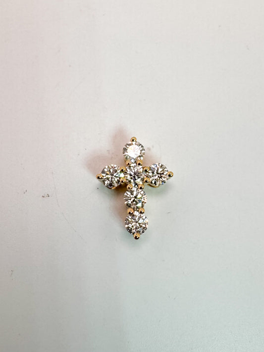 18k,Yellow gold, mini natural diamond cross. .40 carat total weight.