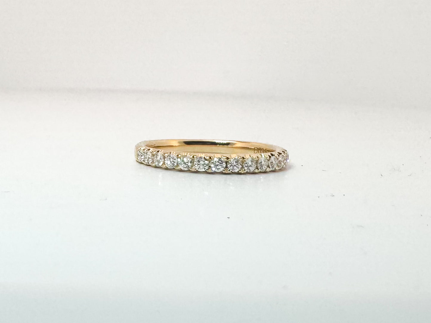 14K, yellow gold, french pave , natural diamond band. .35 diamond total weight.