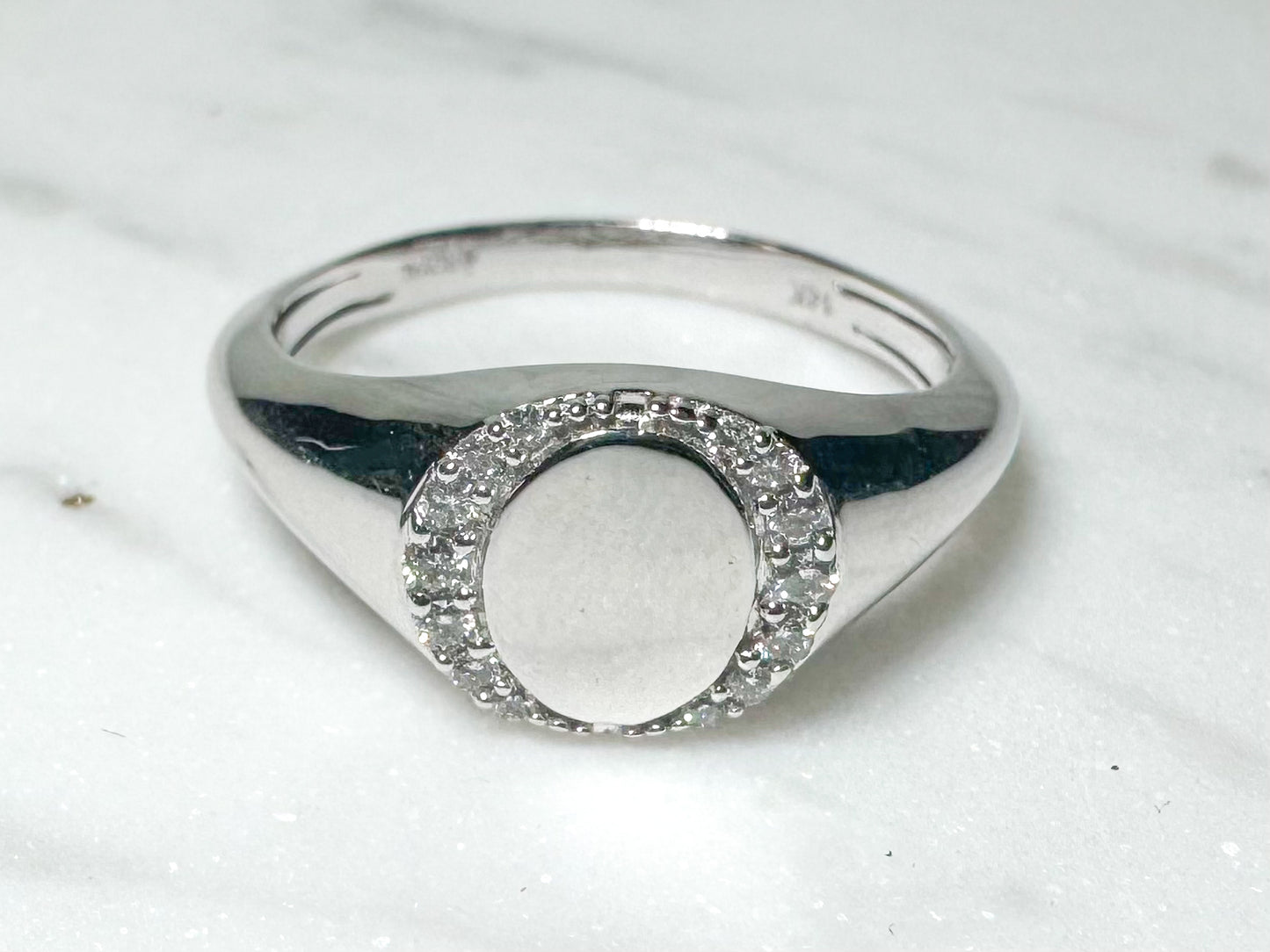 14k, white gold, diamond signet ring..11 diamond total weight.