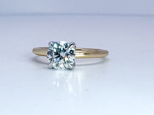 14k two tone 1.21 ideal cut round brilliant, F SI1, set in solitaire with hidden halo