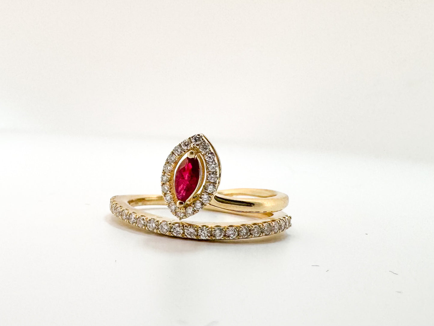 14K, yellow gold, .32 carat natural ruby with .18 carats of side diamonds.
