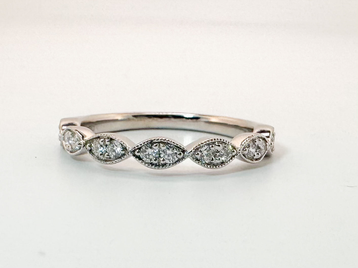 14k, white gold, .25 carat total weight, scalloped natural diamond band.