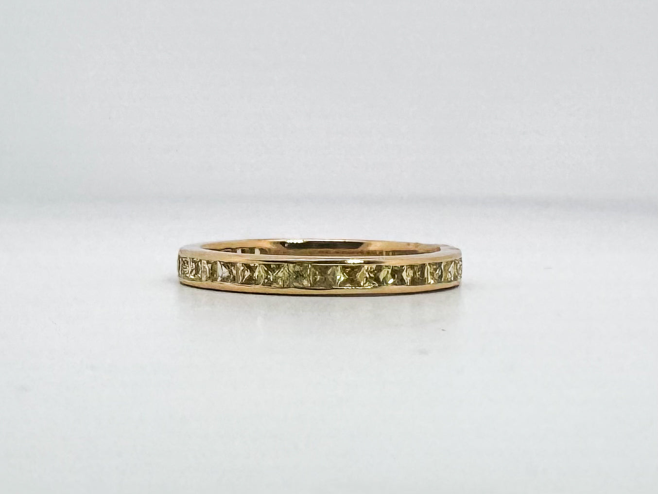 14K, yellow gold, natural yellopw sapphire band .79 cararts