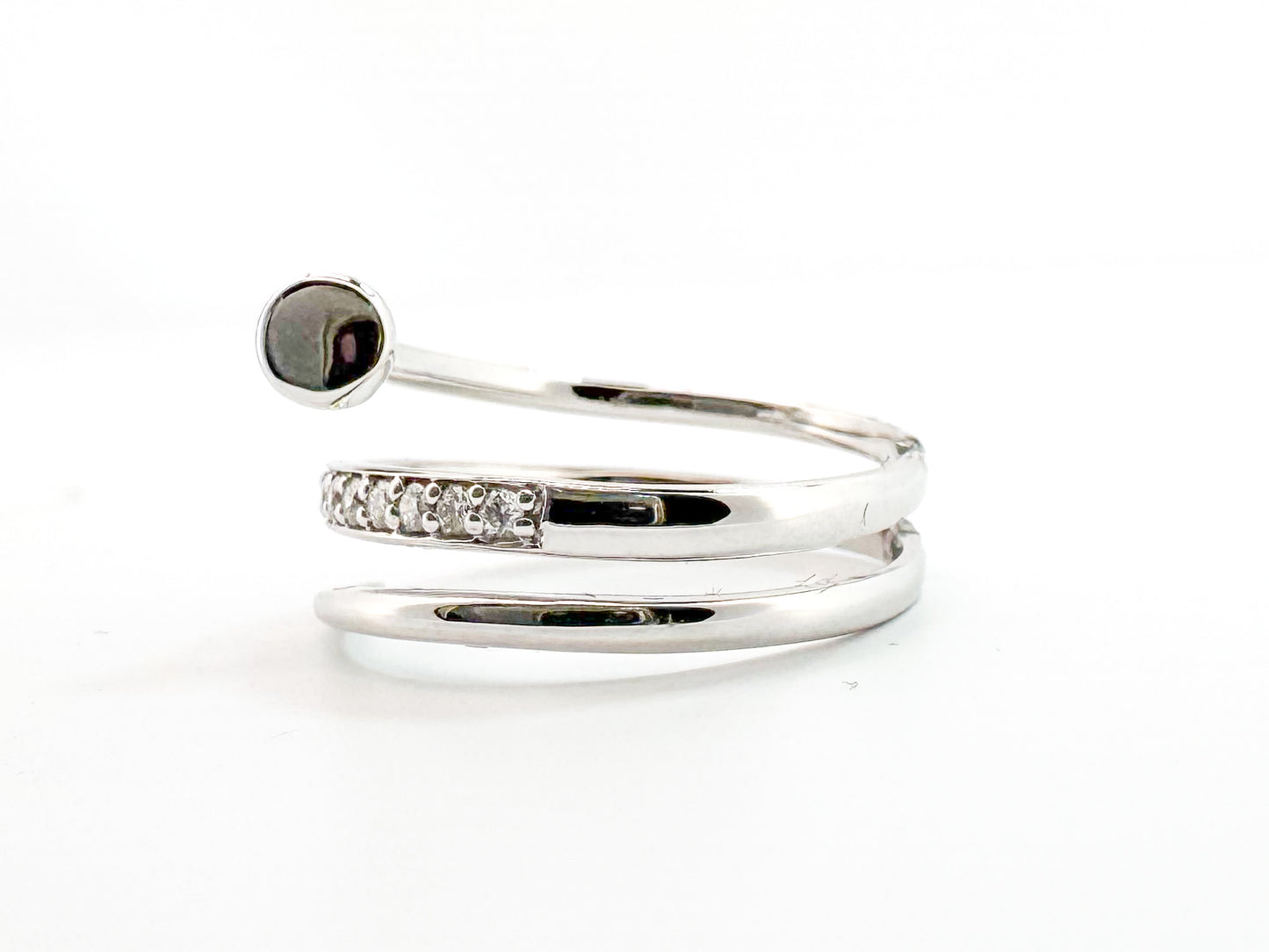 14K, white gold, diamond nail ring. .20 carat total diamond weight.