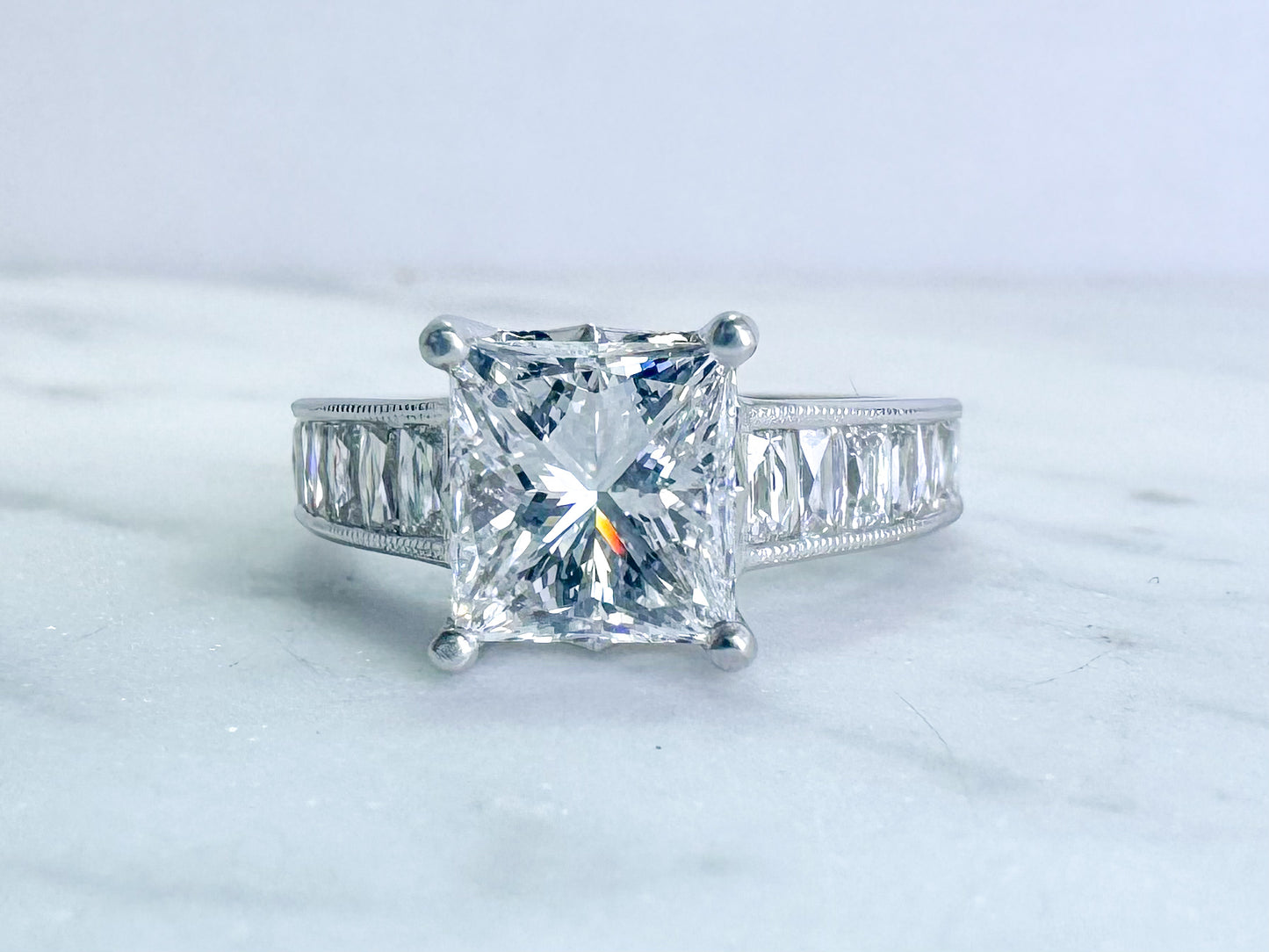 Custom designed, Princess cut and French cut  diamond engagement ring.