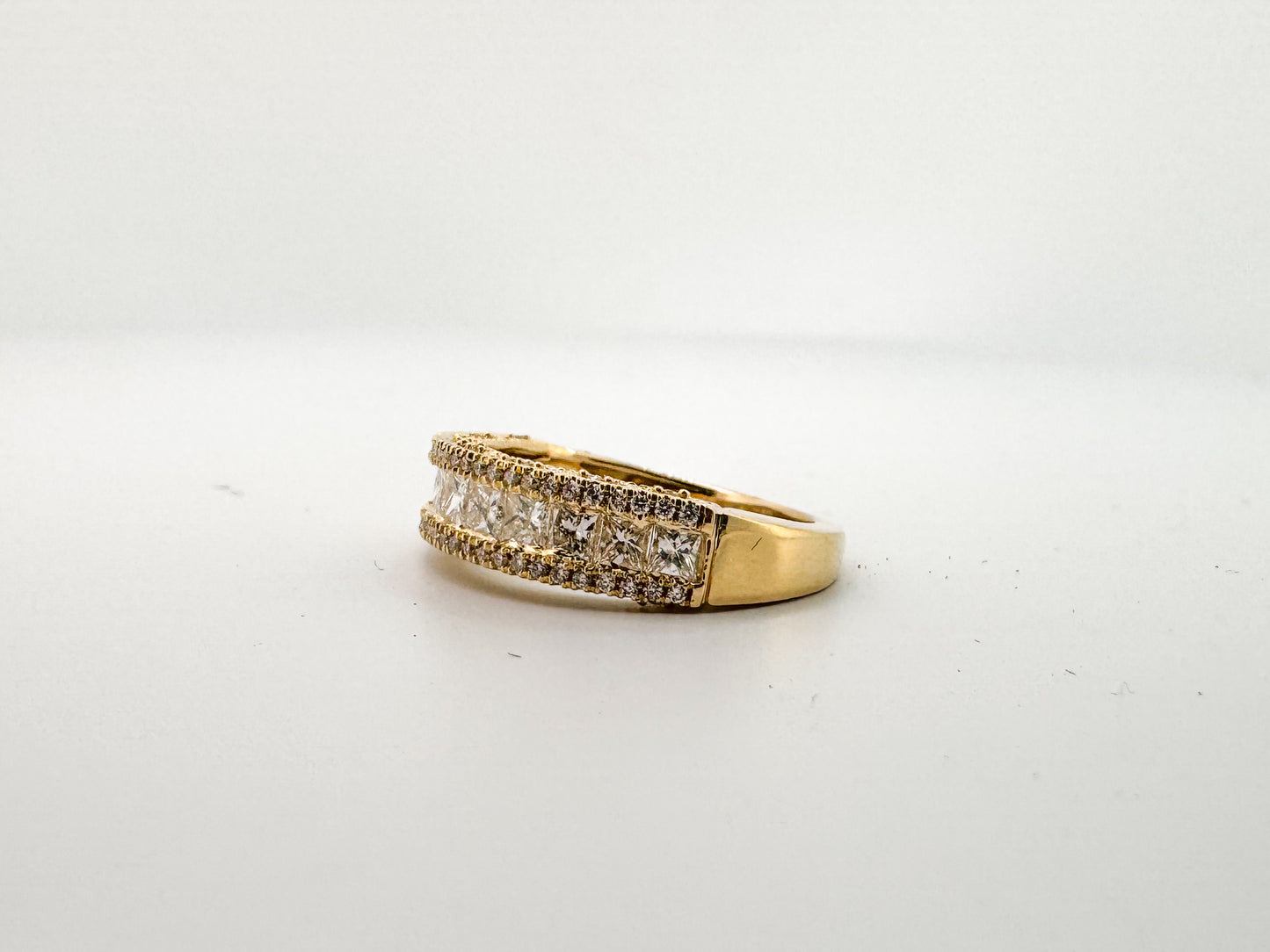 14k, Yellow gold ,princess cut and round brilliant diamond band.1.27 carats of natural diamonds.