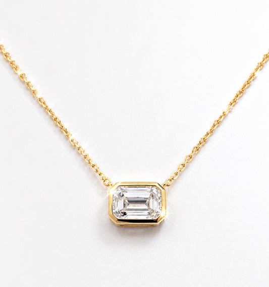 14K, yellow gold, .50 carat emerald cut, lab grown diamond pendant.