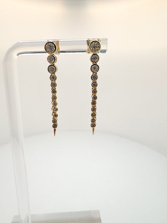 14K, Yellow gold .77 dtw bezel set diamond dangle earrings.