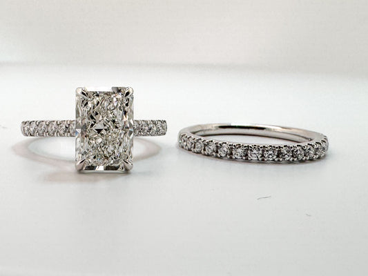 14K,White gold, 3.07 carat raident cut diamond wedding set. .68 side diamonds. IGI certified